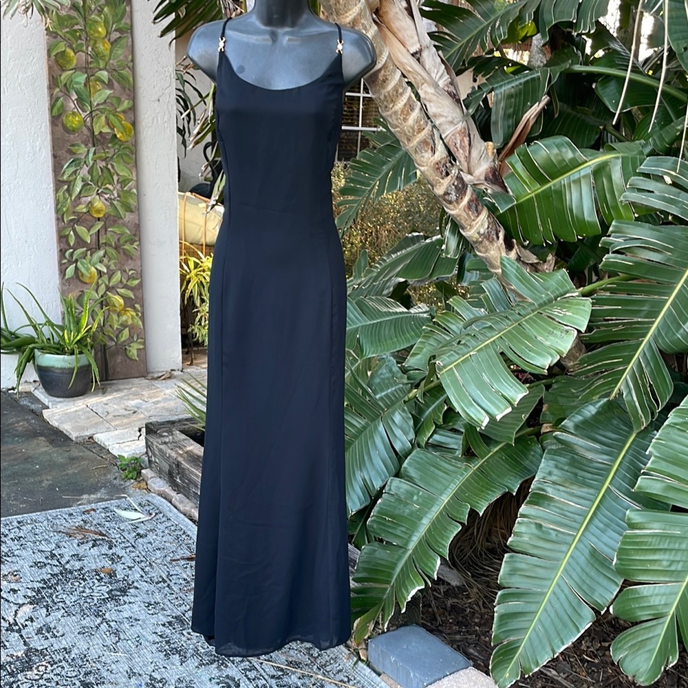 Maxi slip dress with rhinestone bows by Jessica McClintock’s Gunney Sax